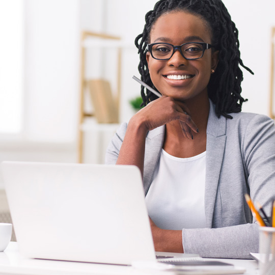 Woman sitting at computer